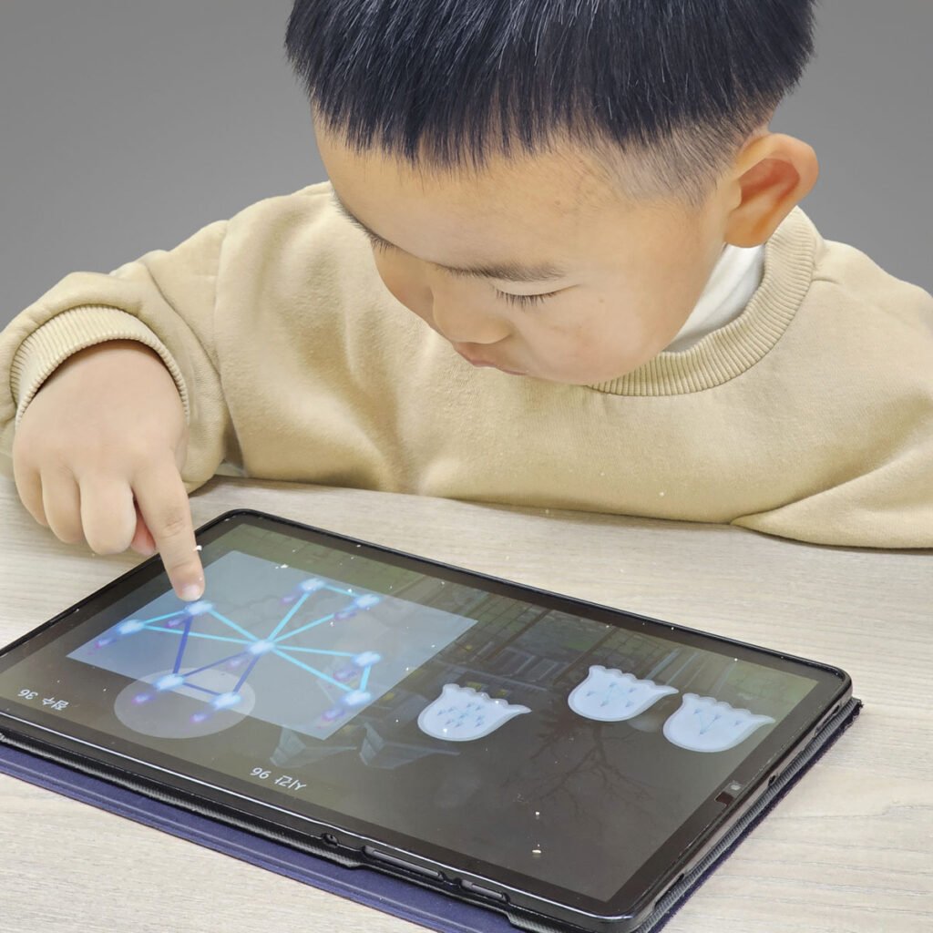 Close-up of a child focused on a cognitive training task in tallerRx during a clinical study